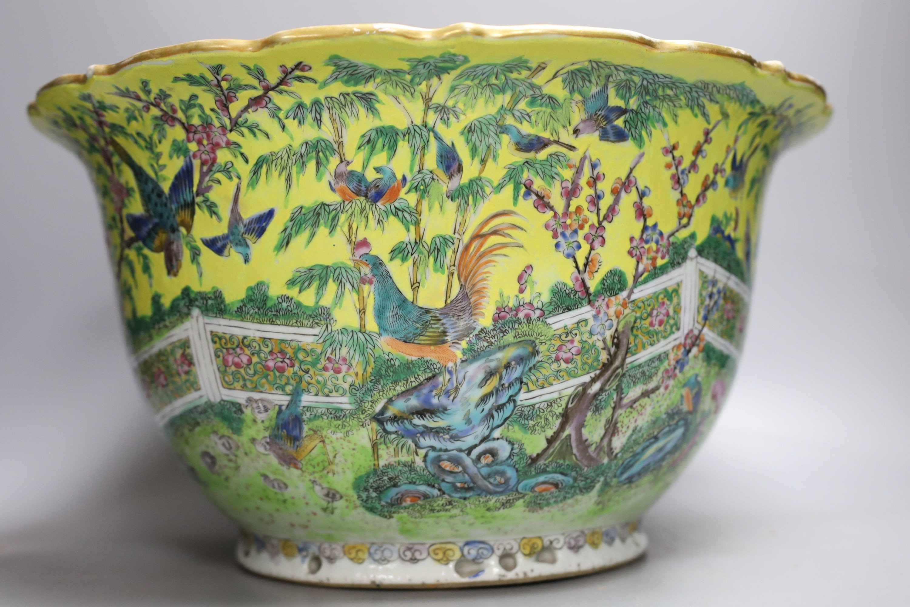 A Chinese yellow ground flower pot, early 20th century, 38cm diameter